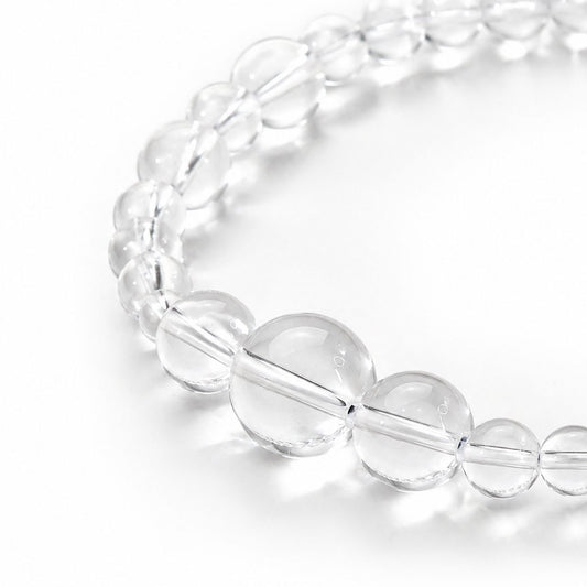 Clear Quartz Silver Veil Bracelet on a clean white background with transparent clear quartz beads.