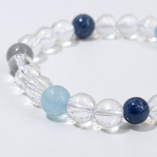 Close-up of blue kyanite moonstone and clear quartz beads on Veyra Grove bracelet