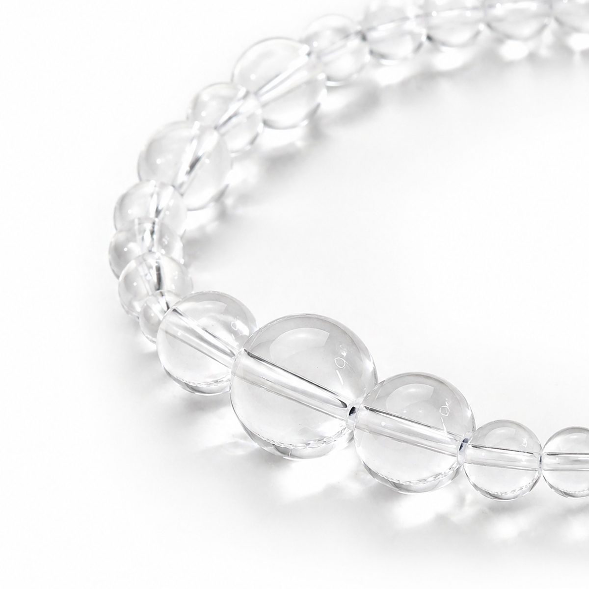 Close-up of the Clear Quartz Silver Veil Bracelet showing transparent clear quartz beads.