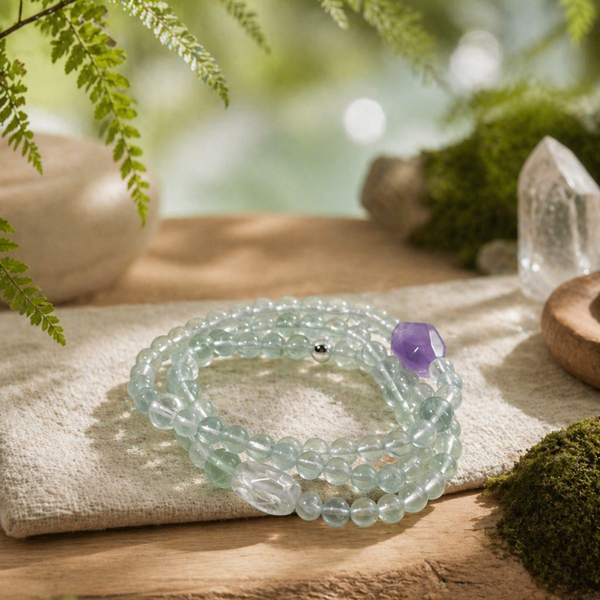 Green fluorite amethyst crystal bracelet styled with soft morning light and natural textures